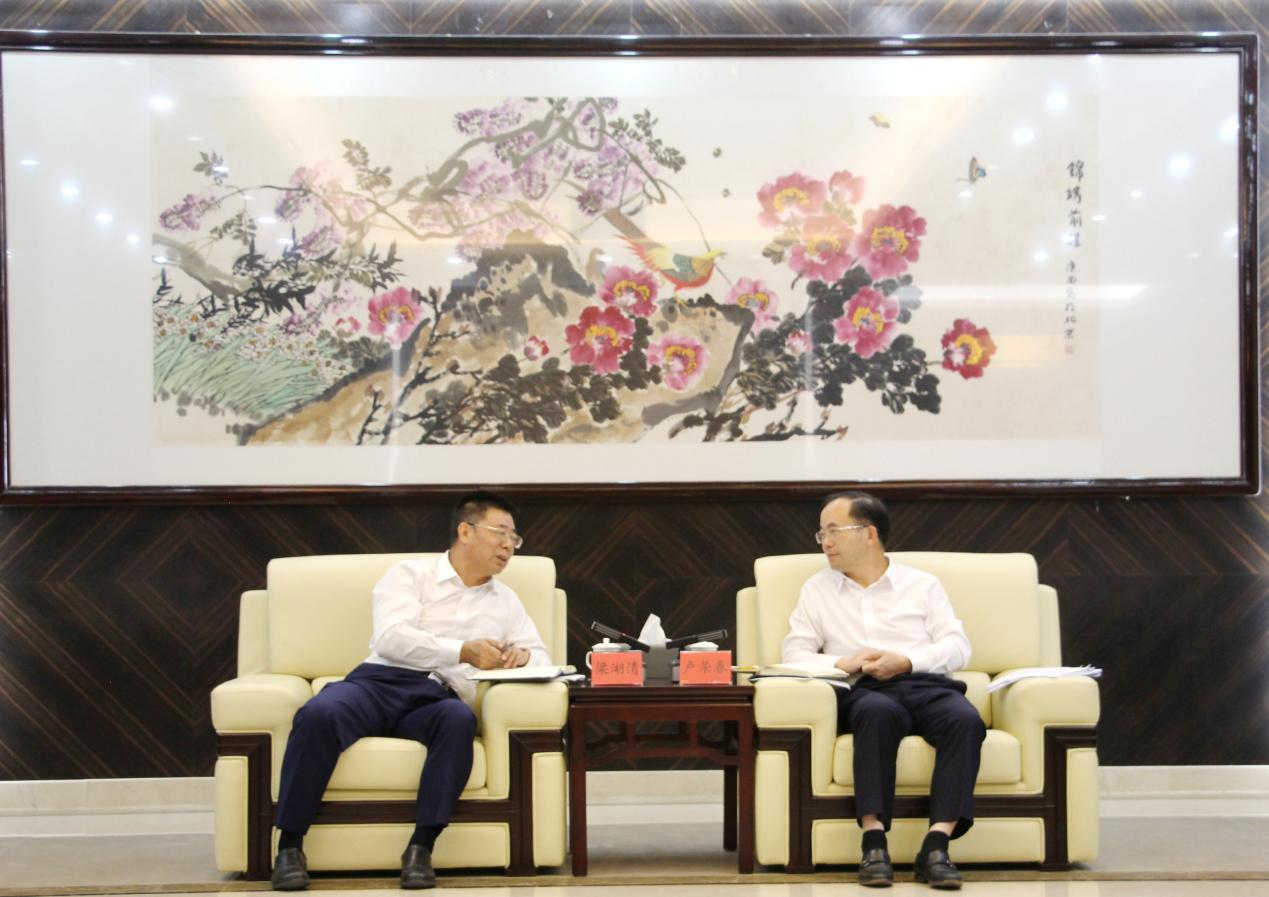 廣州建築梁湖清拜會(huì)雲浮市委書記盧榮春